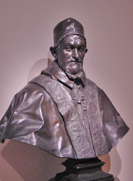 a statue is shown in a light brown background