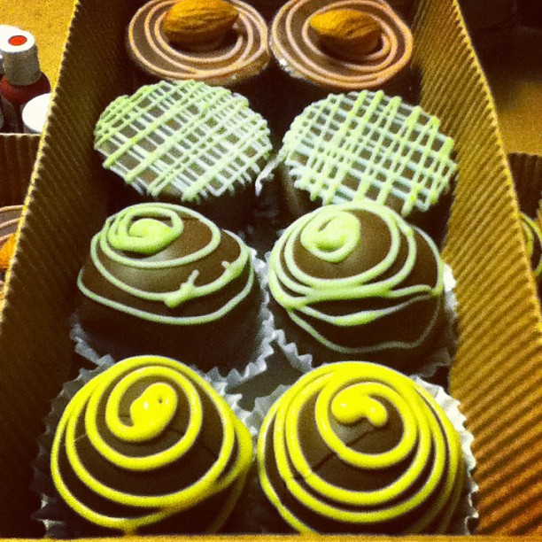 a close up of a box of cupcakes