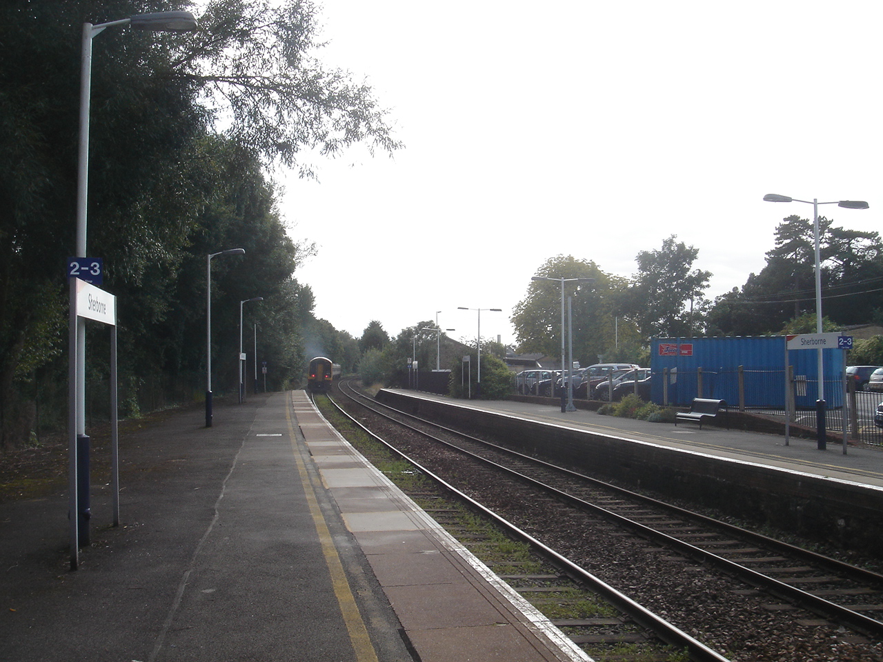 a train track next to a train platform