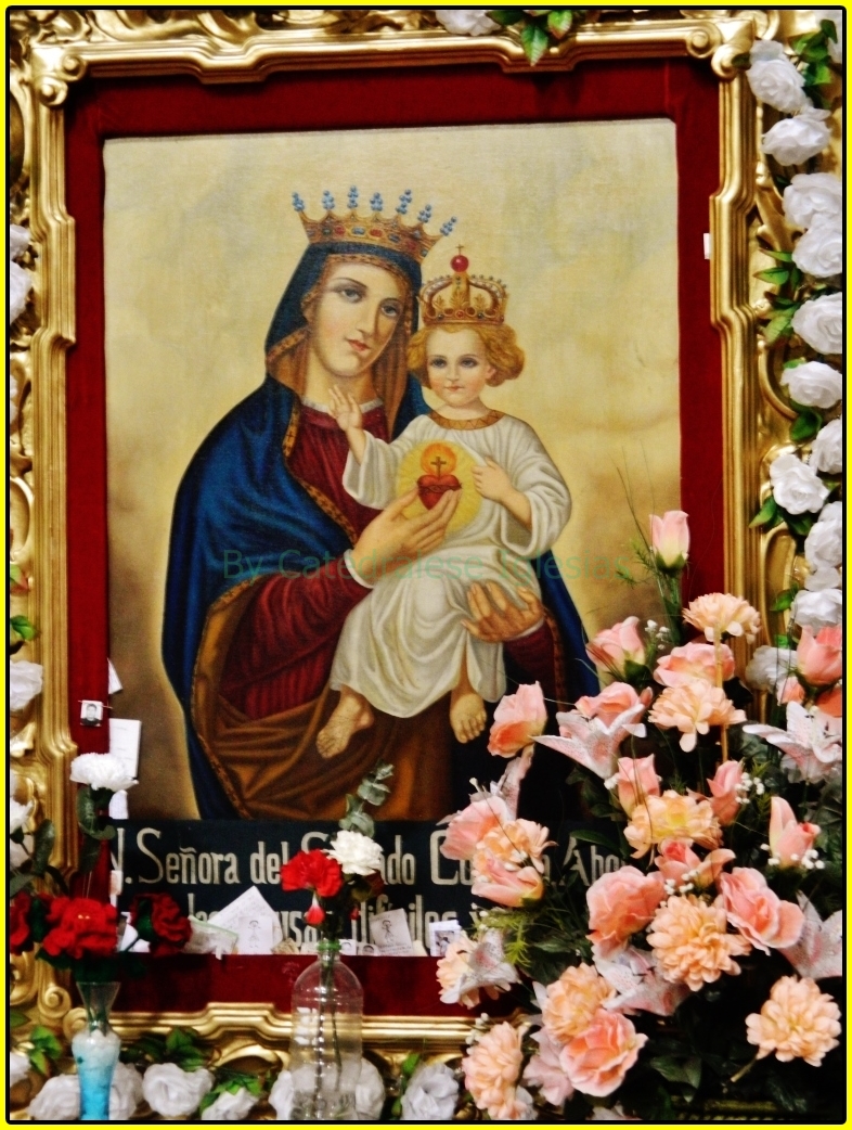 a picture of a baby with the face of jesus, surrounded by flowers