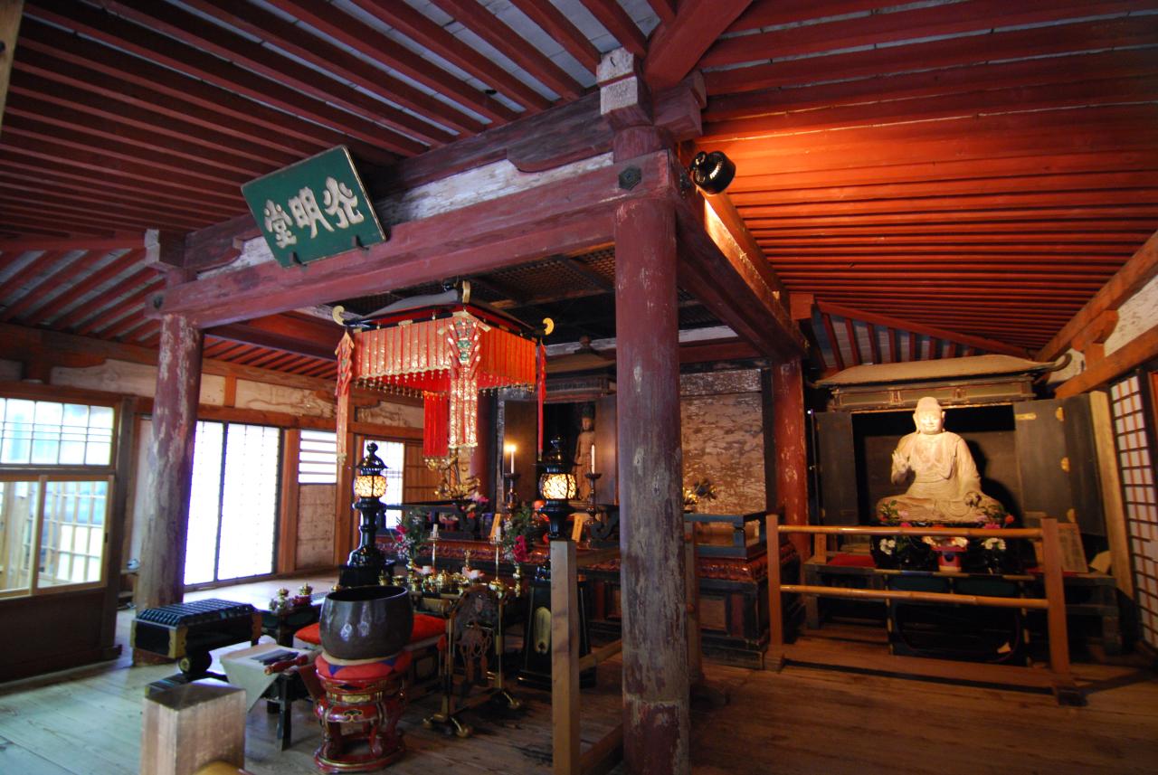 a group of asian people are in a temple