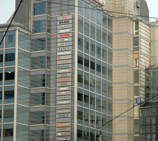 a large building with many traffic signs on it
