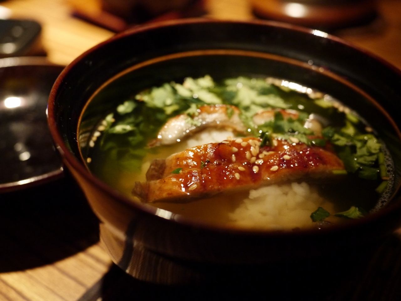 a bowl of food is sitting on the table