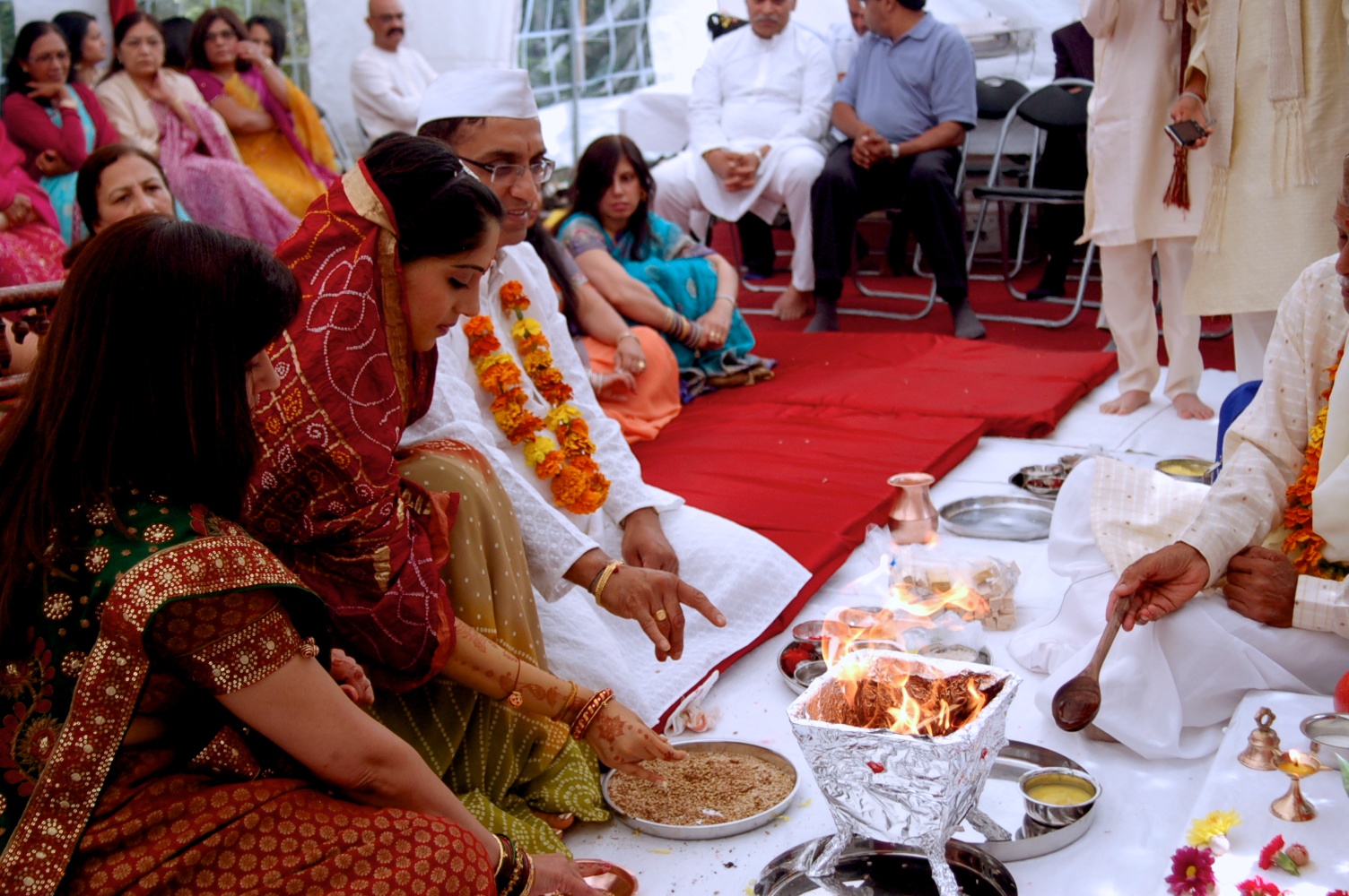 a group of people sitting around a table together