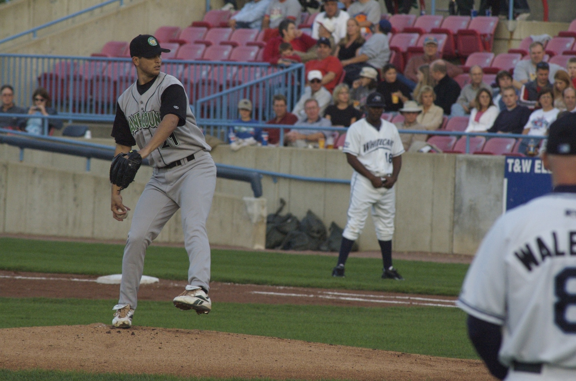 two baseball players standing on a field