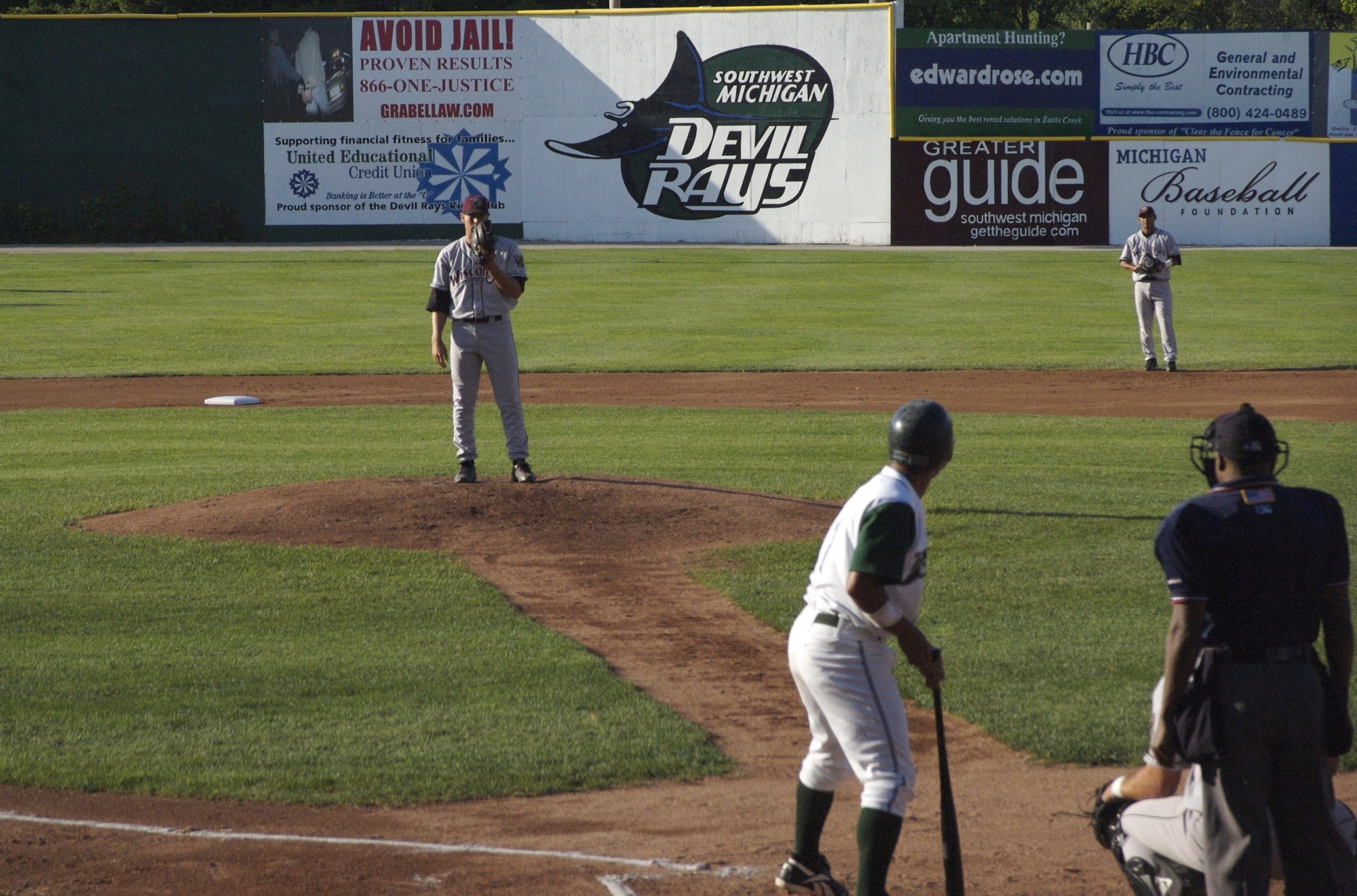 a number of baseball players on a field