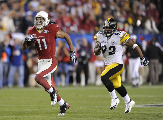 an image of two players in action playing football