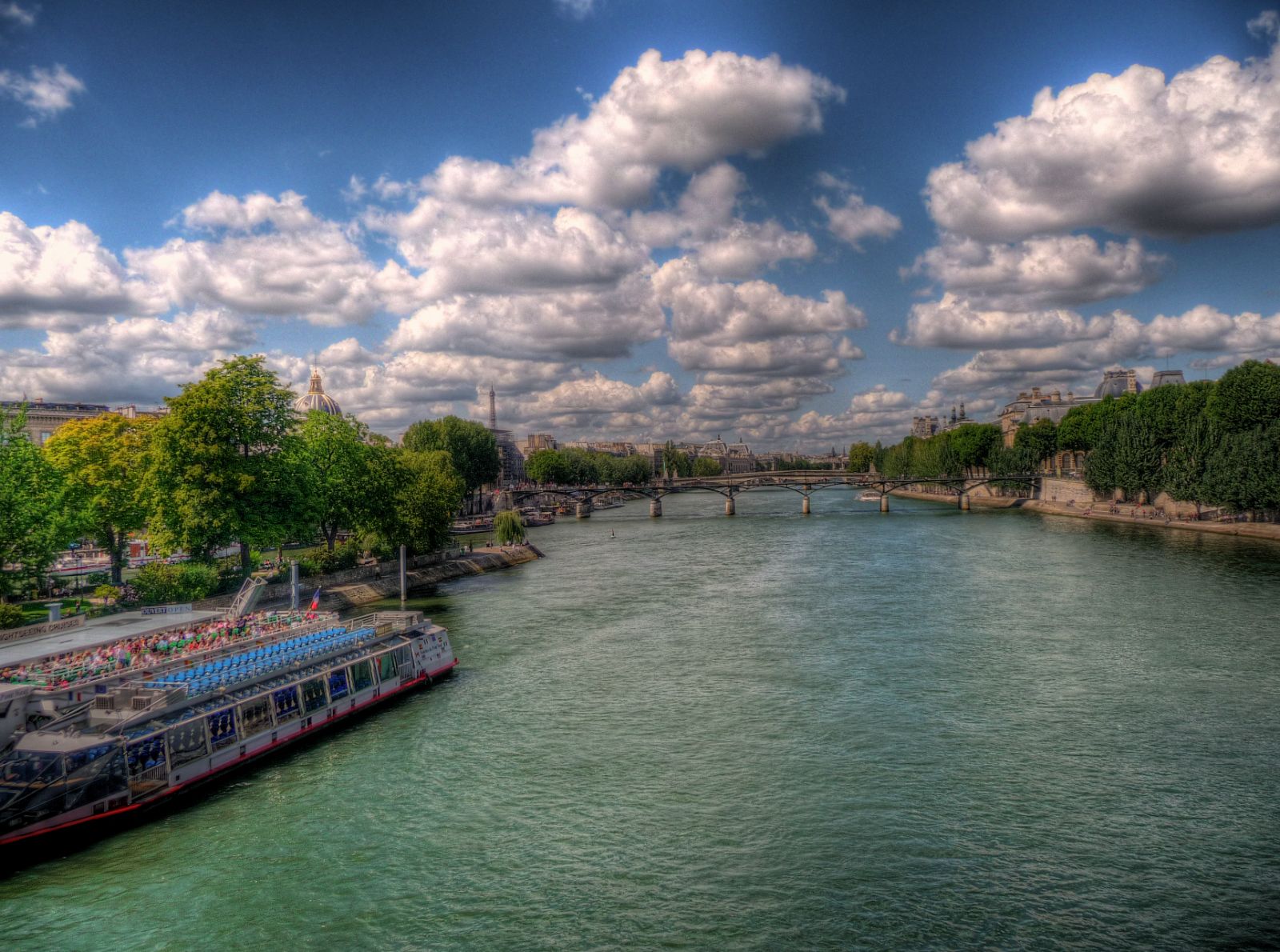 a river running through a green city