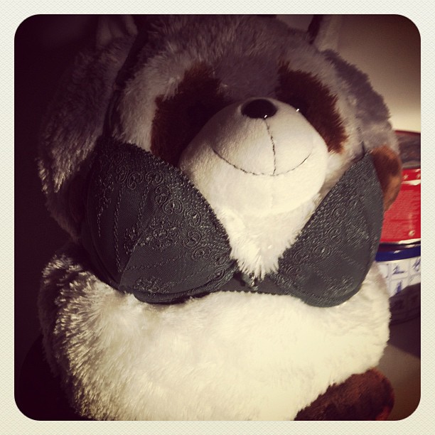stuffed animal teddy bear dressed in black and brown bow tie