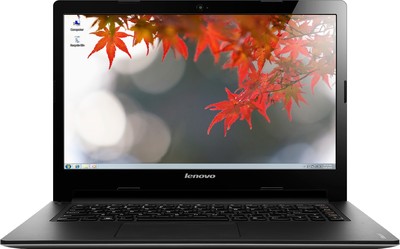 an open laptop computer with autumn leaves on it