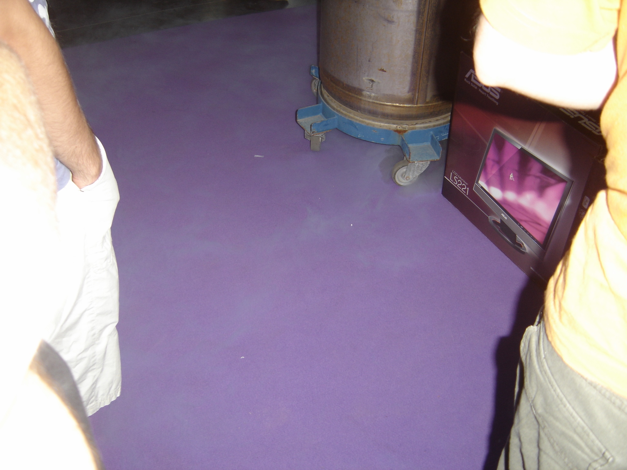 the view of a small purple floor with some people