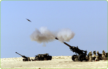 tanks shooting at the camera during an airshow