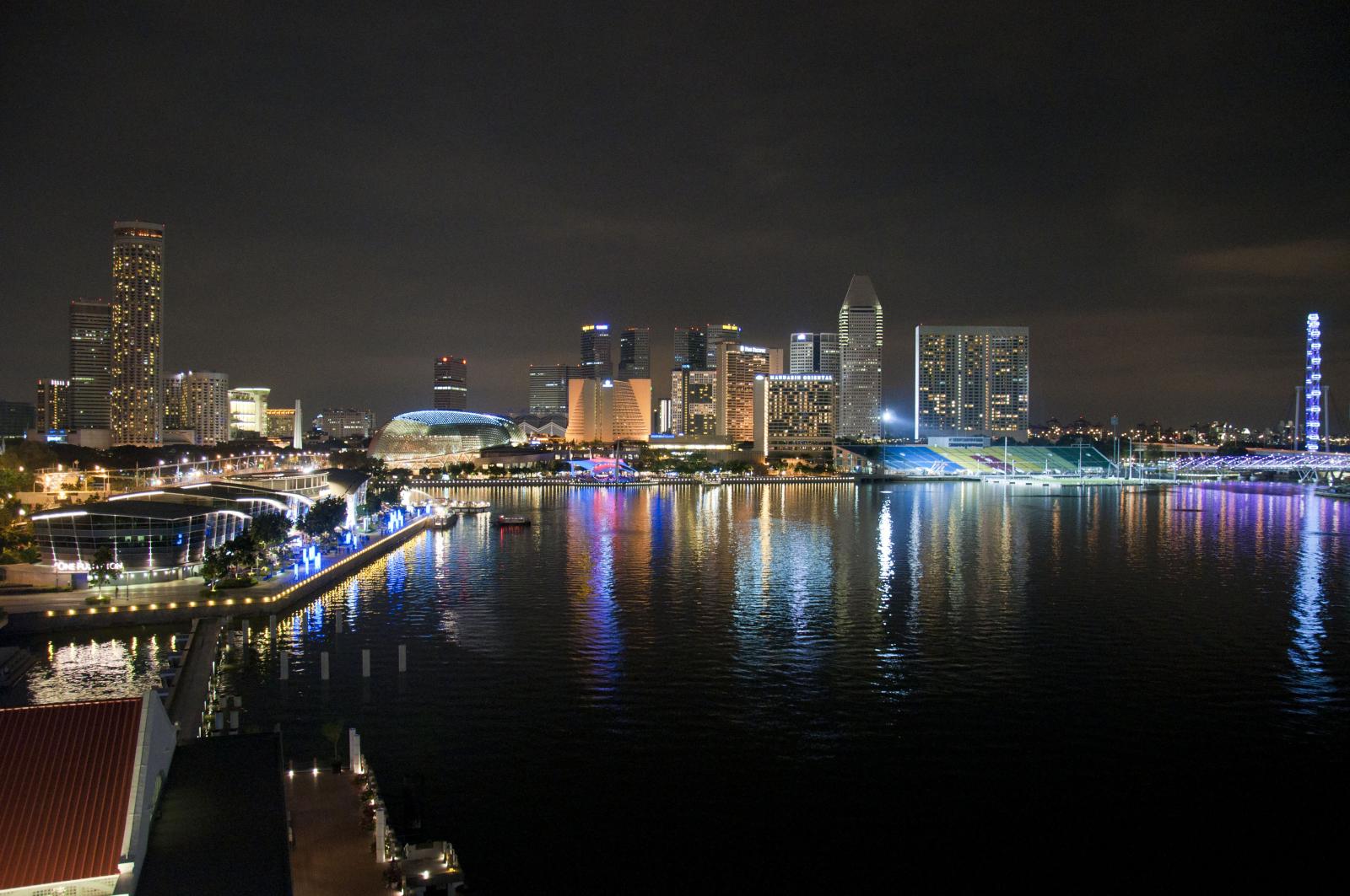 night time city lights reflected in the water