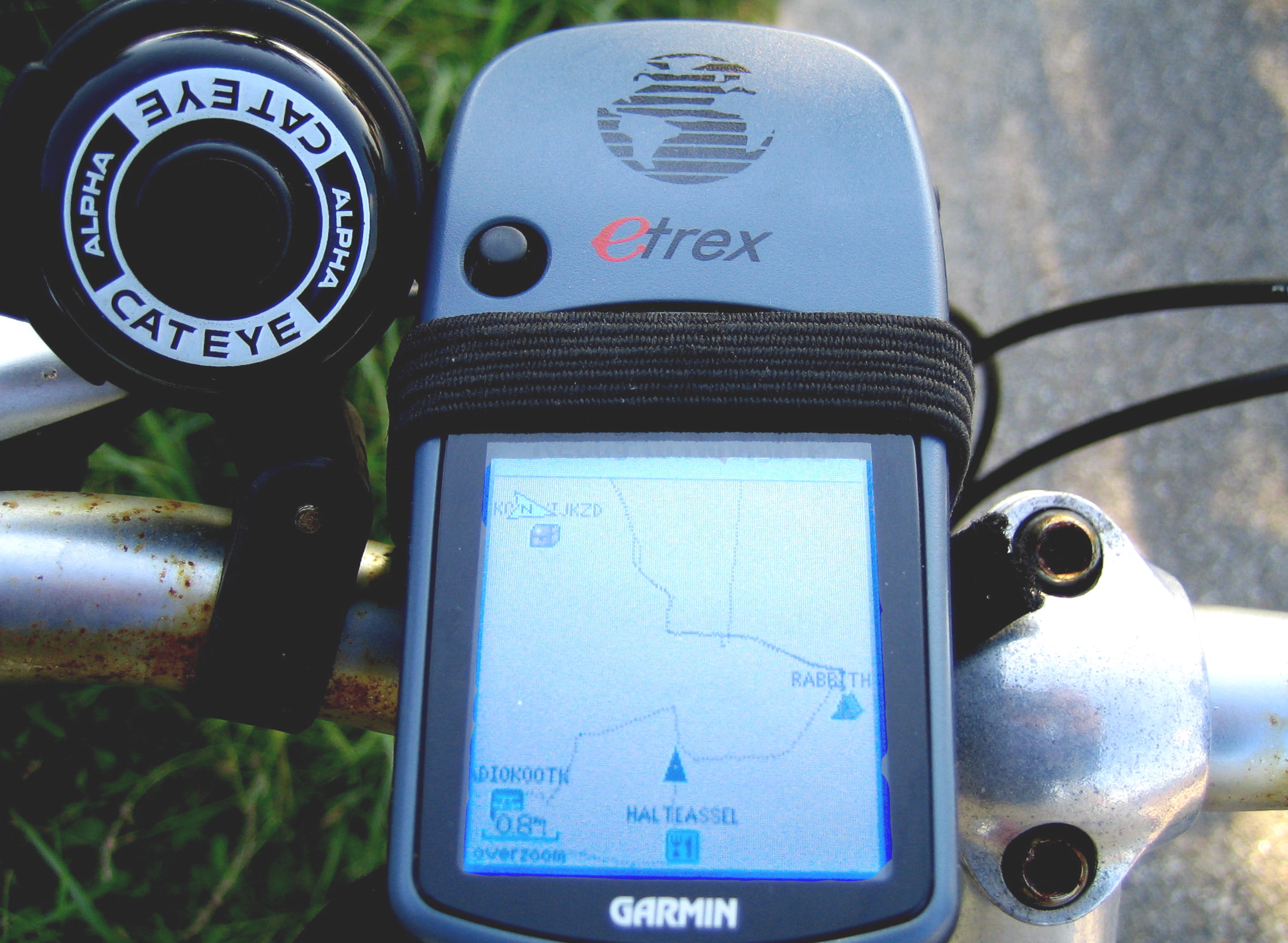 a close up of a bike with a gps