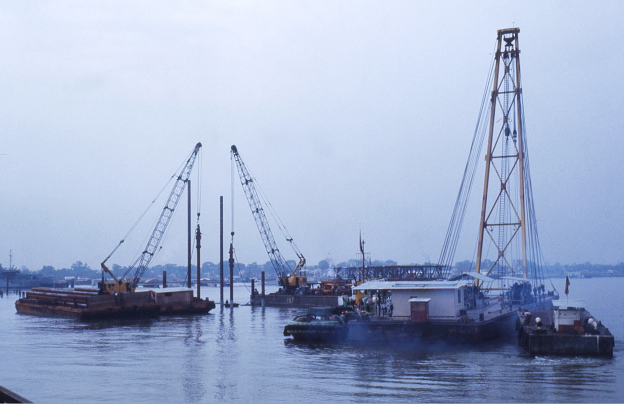 a boat in a body of water surrounded by boats