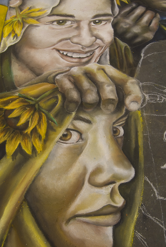 this is an artwork painting of two people with sunflowers