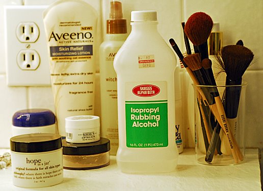 several cosmetics and hygiene products are on a counter