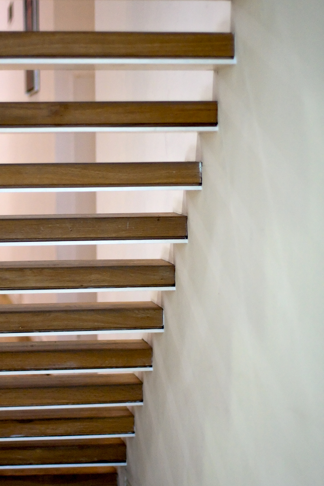 a staircase has lots of wooden slats on it