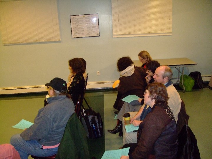 a group of people in an office area