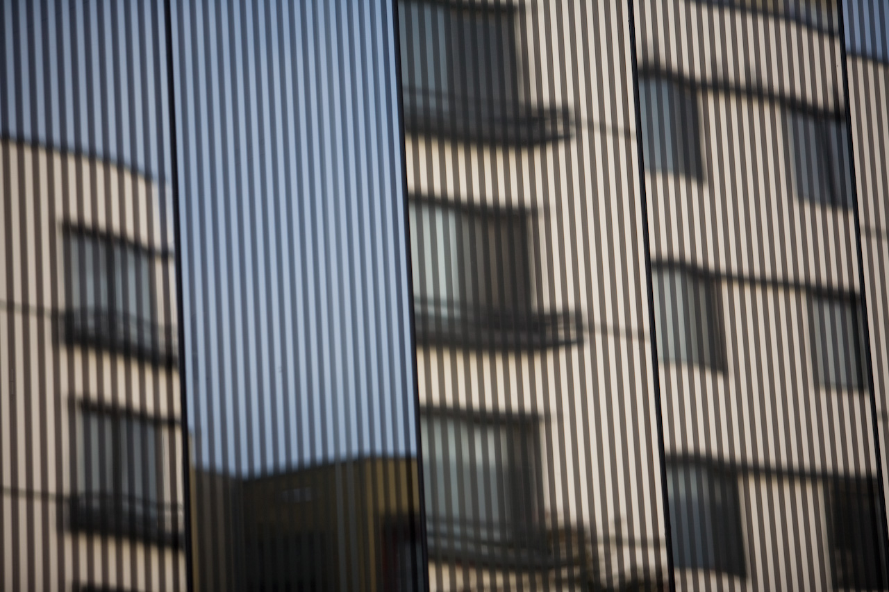 the side of a building with very small windows