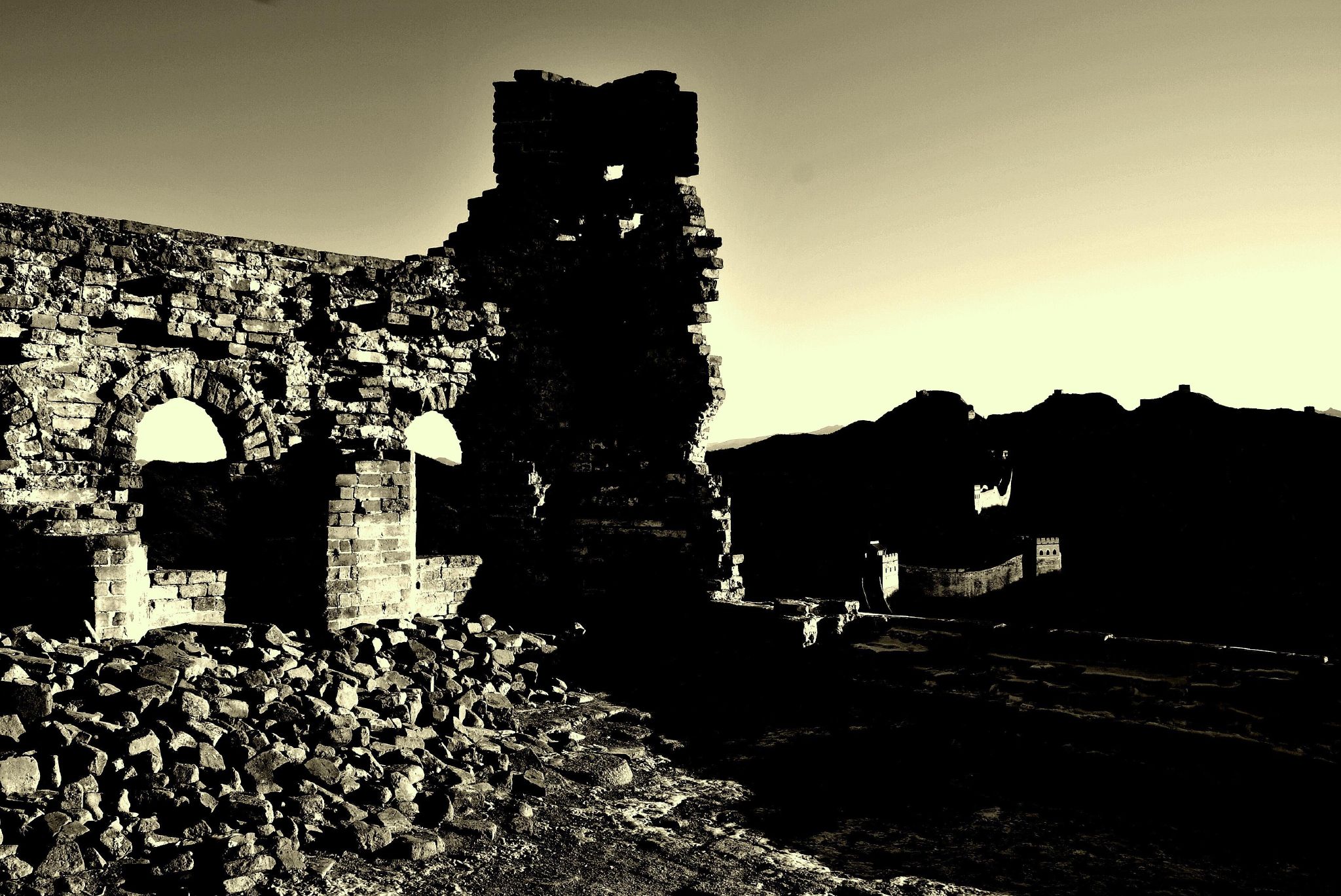 an ancient stone building with multiple windows