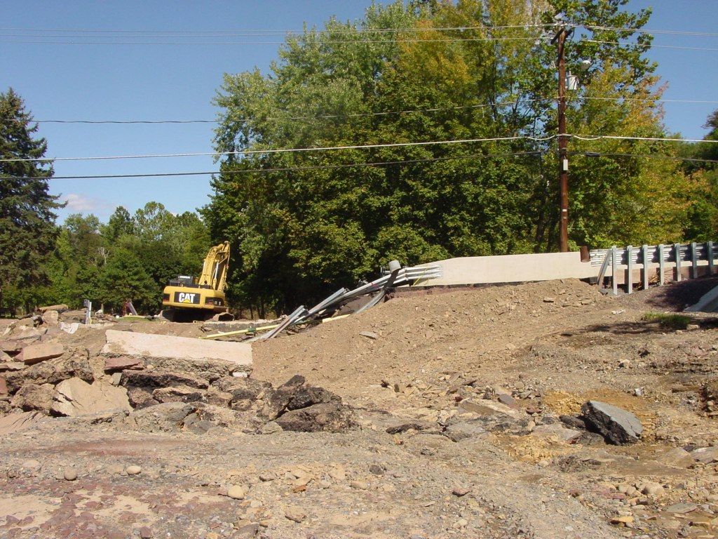 construction underway on an apartment complex, with construction equipment