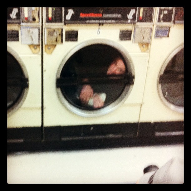 there is a man in a washing machine that is inside