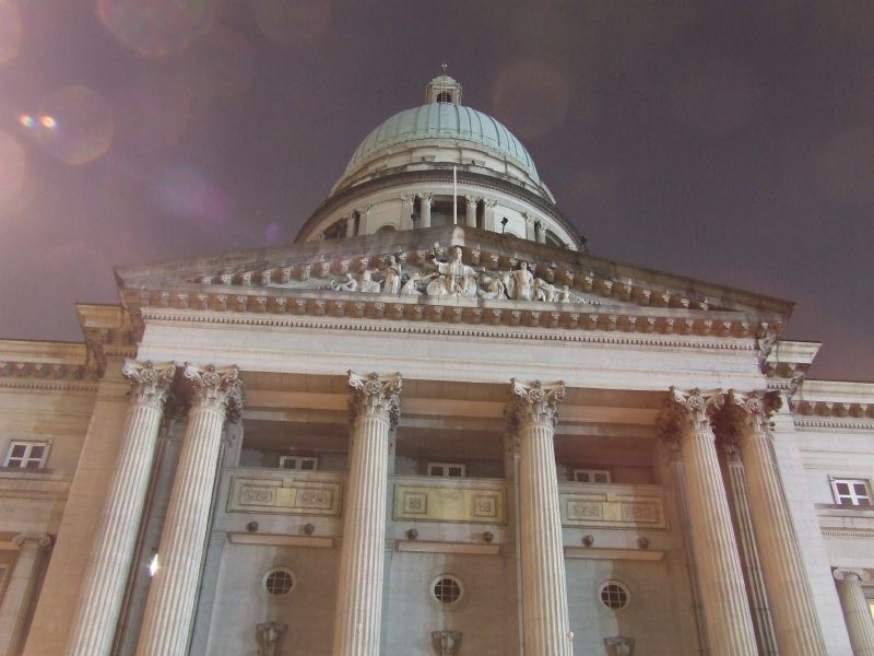 a picture of a building with columns and a dome