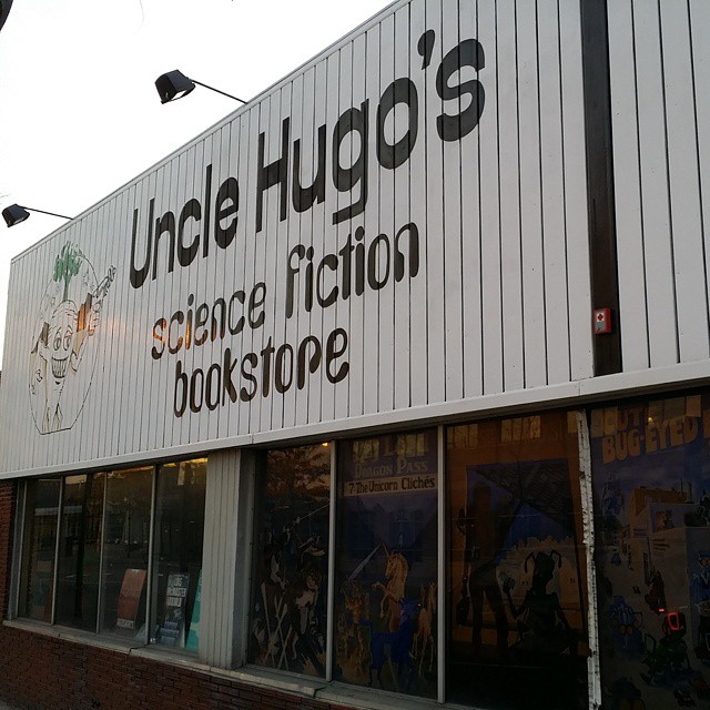 an unhelugh's science fiction bookstore with many books in their window