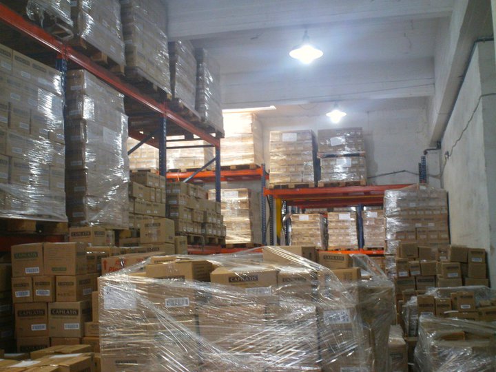 storage in a large warehouse filled with pallets