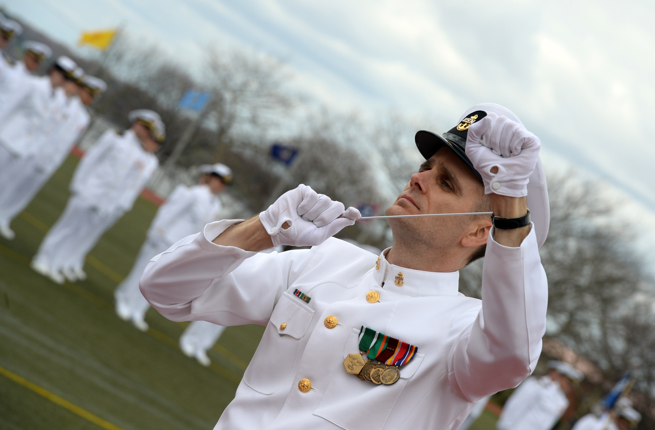 military band performing an exercise on the course