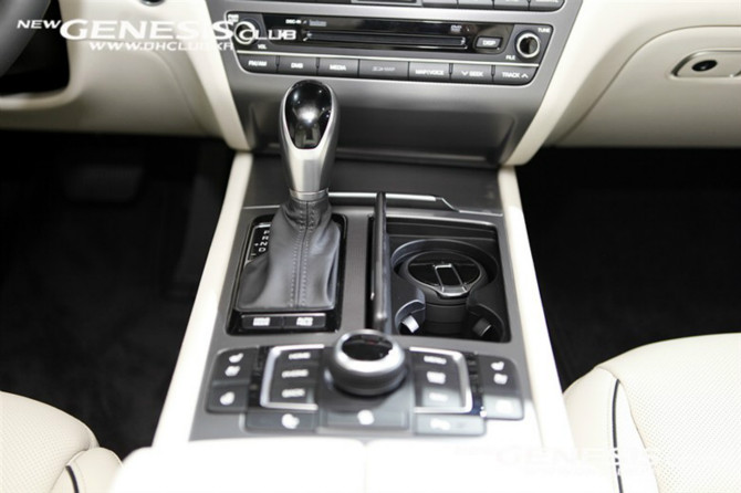 a car interior shows controls and steering wheel ons