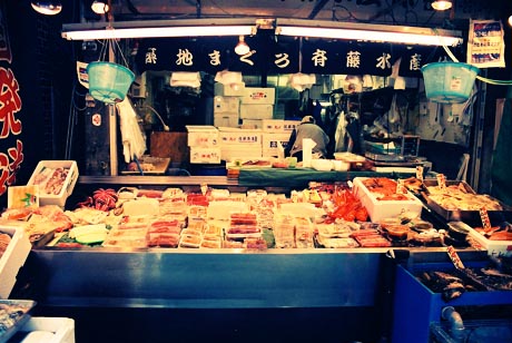 a large fish and food stand in a seafood shop