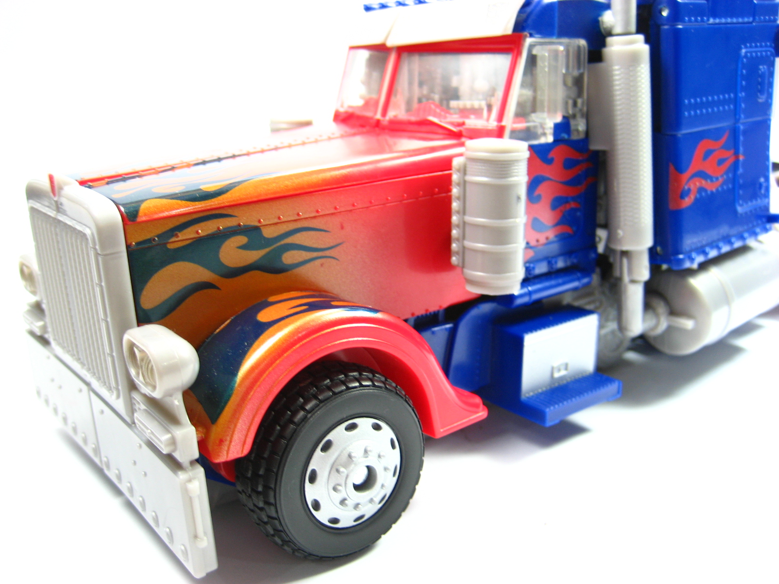 a toy truck is displayed on a white background