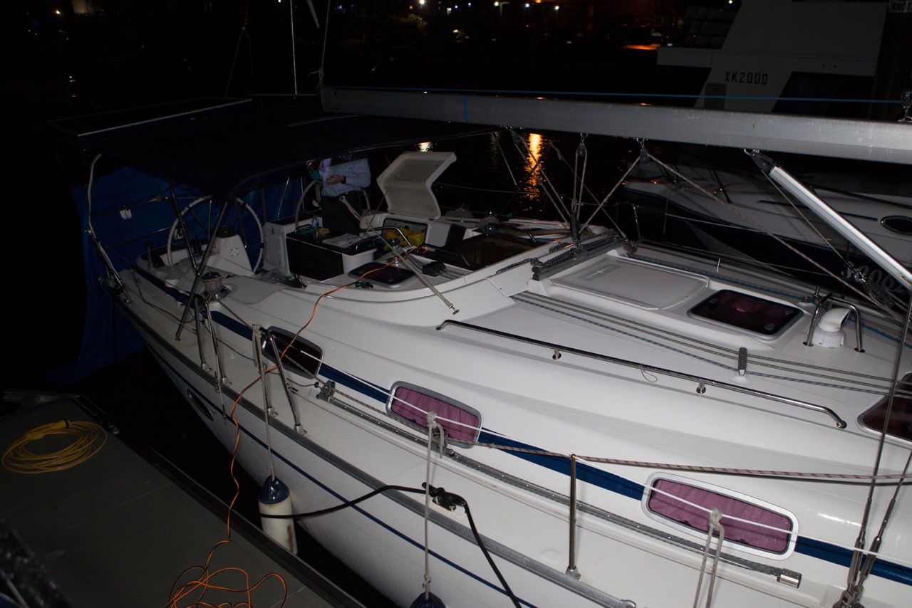 the front of a sail boat is lit up