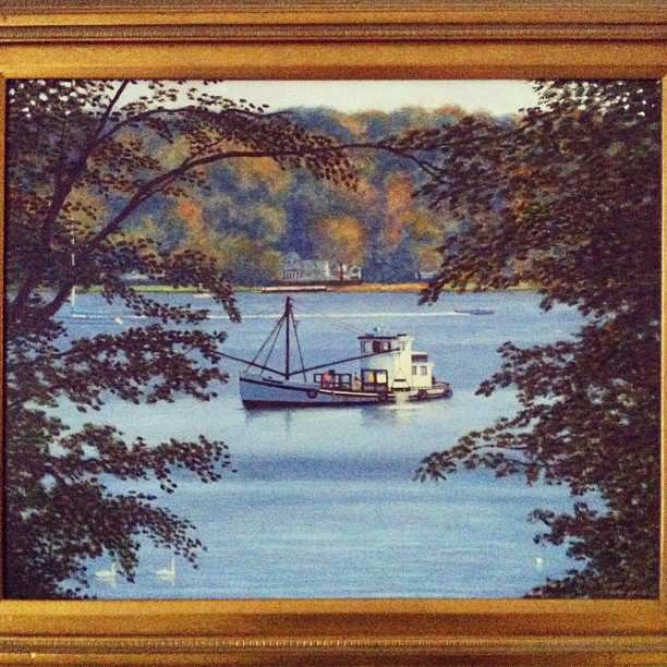 painting of fishing boat going down the river