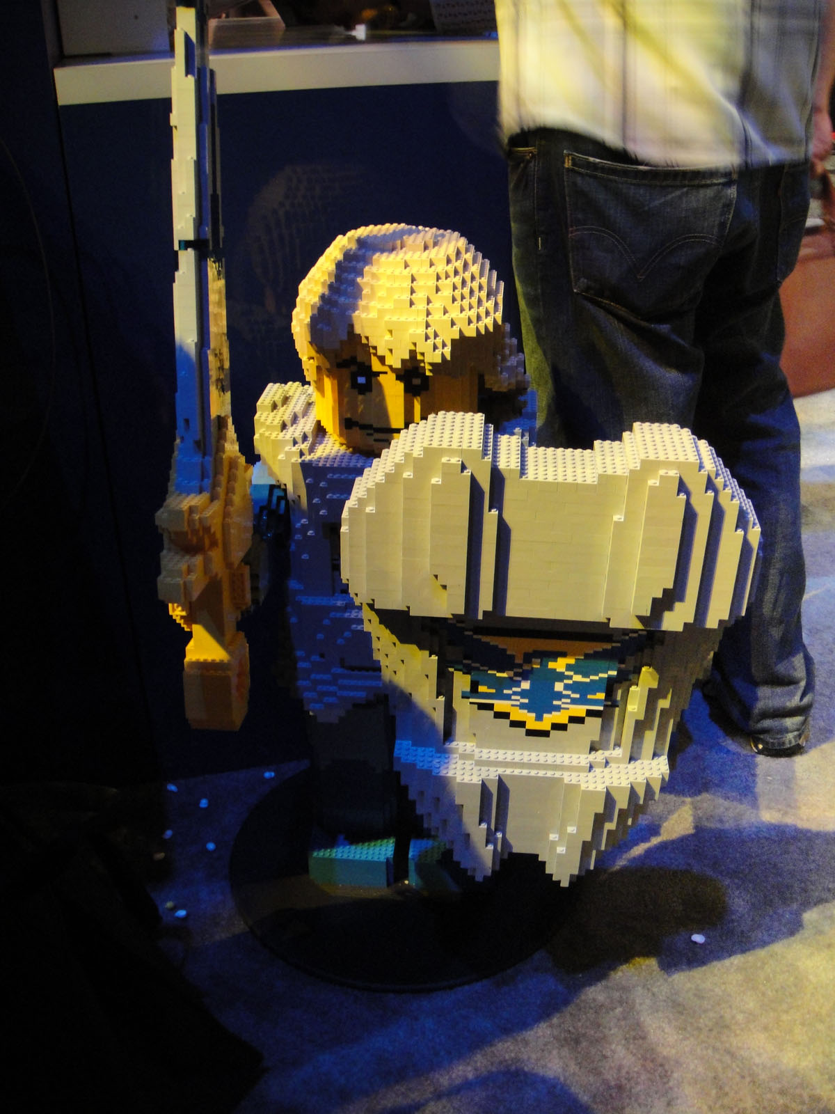 a toy gun that is set into the lego display