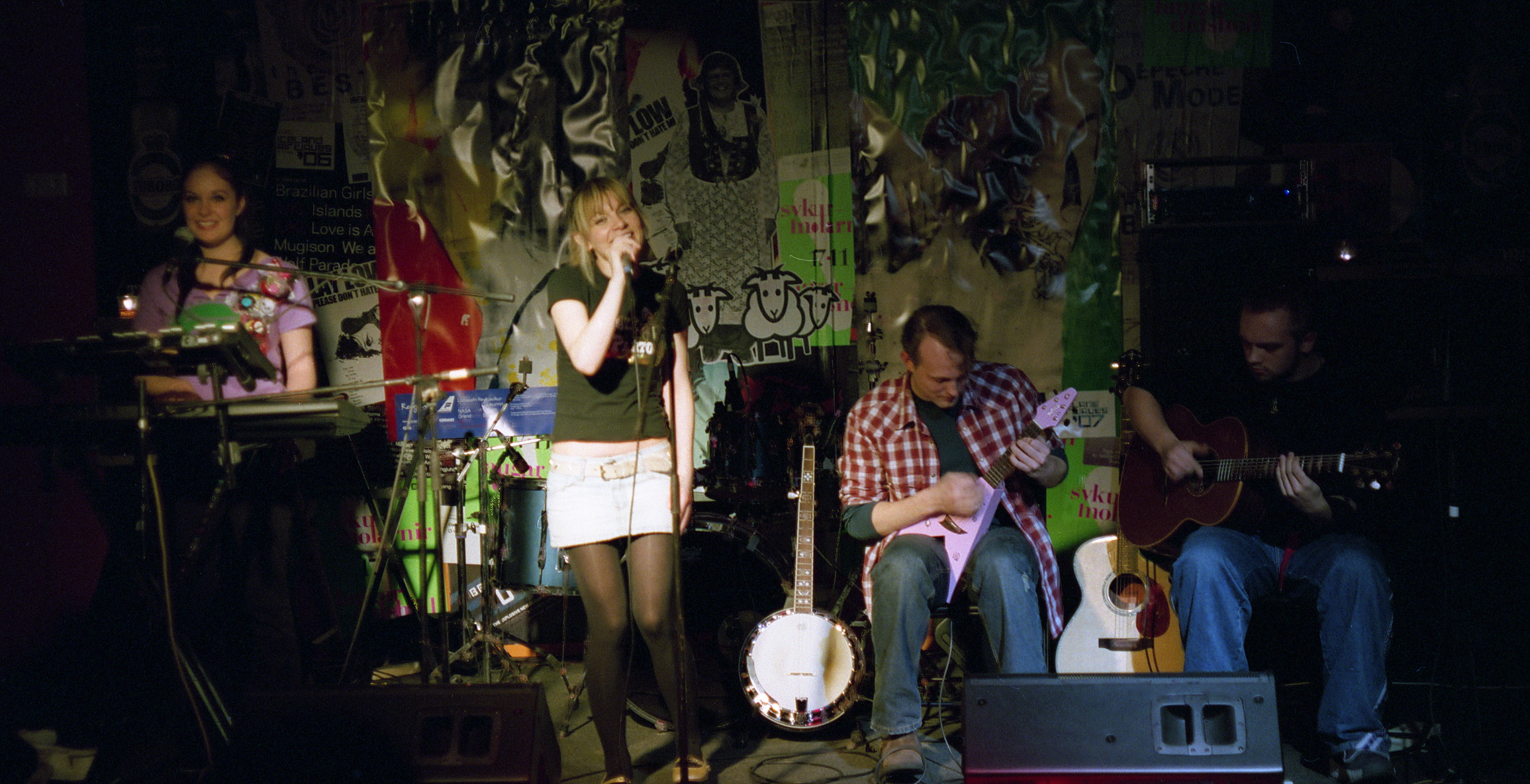 a group of young people standing next to each other