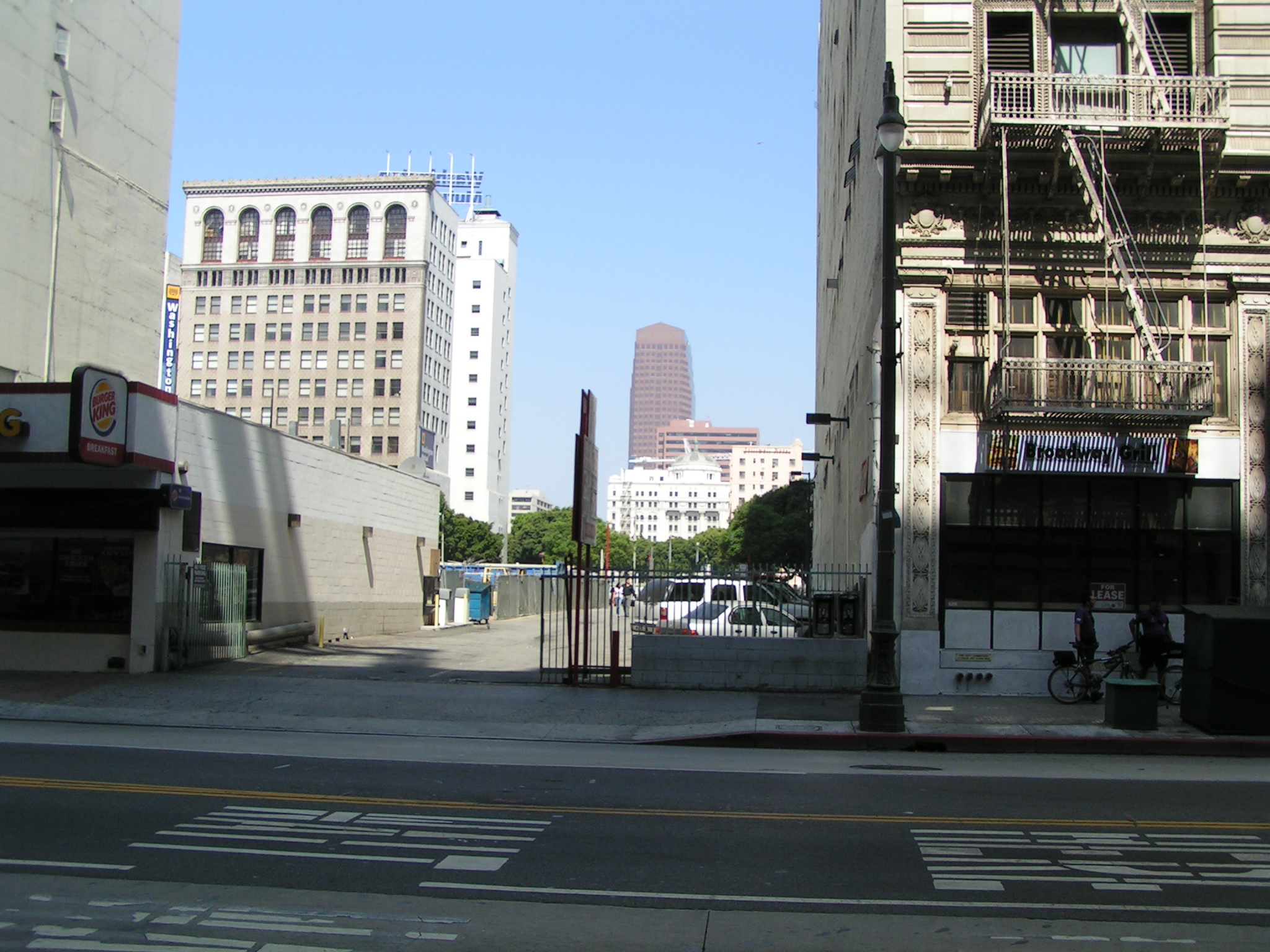 a city street with some buildings in the background