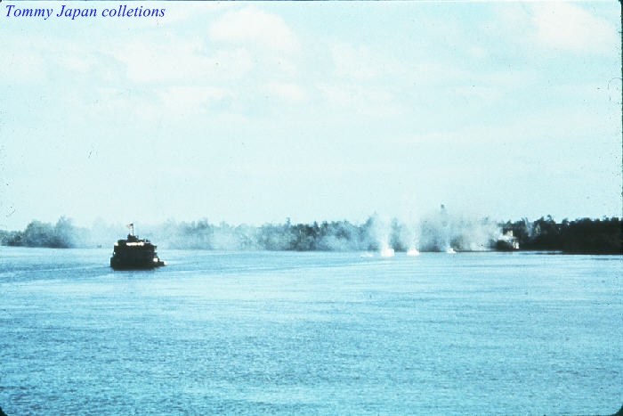 two boat with smoke coming out of the back