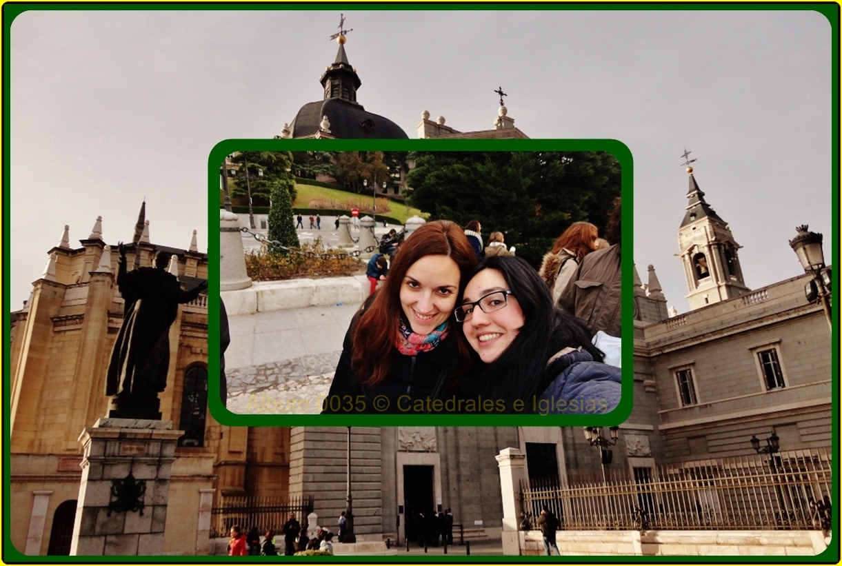 two people are smiling while posing in front of buildings