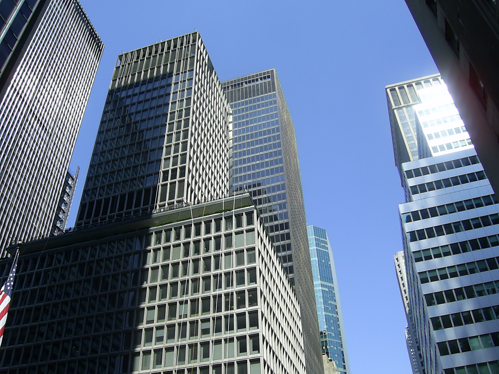 several tall buildings sit next to each other