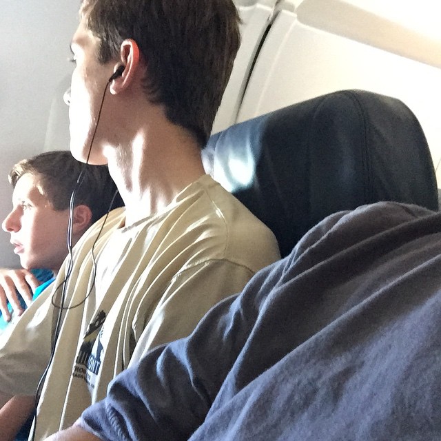 there are some guys that are sitting in the airplane together