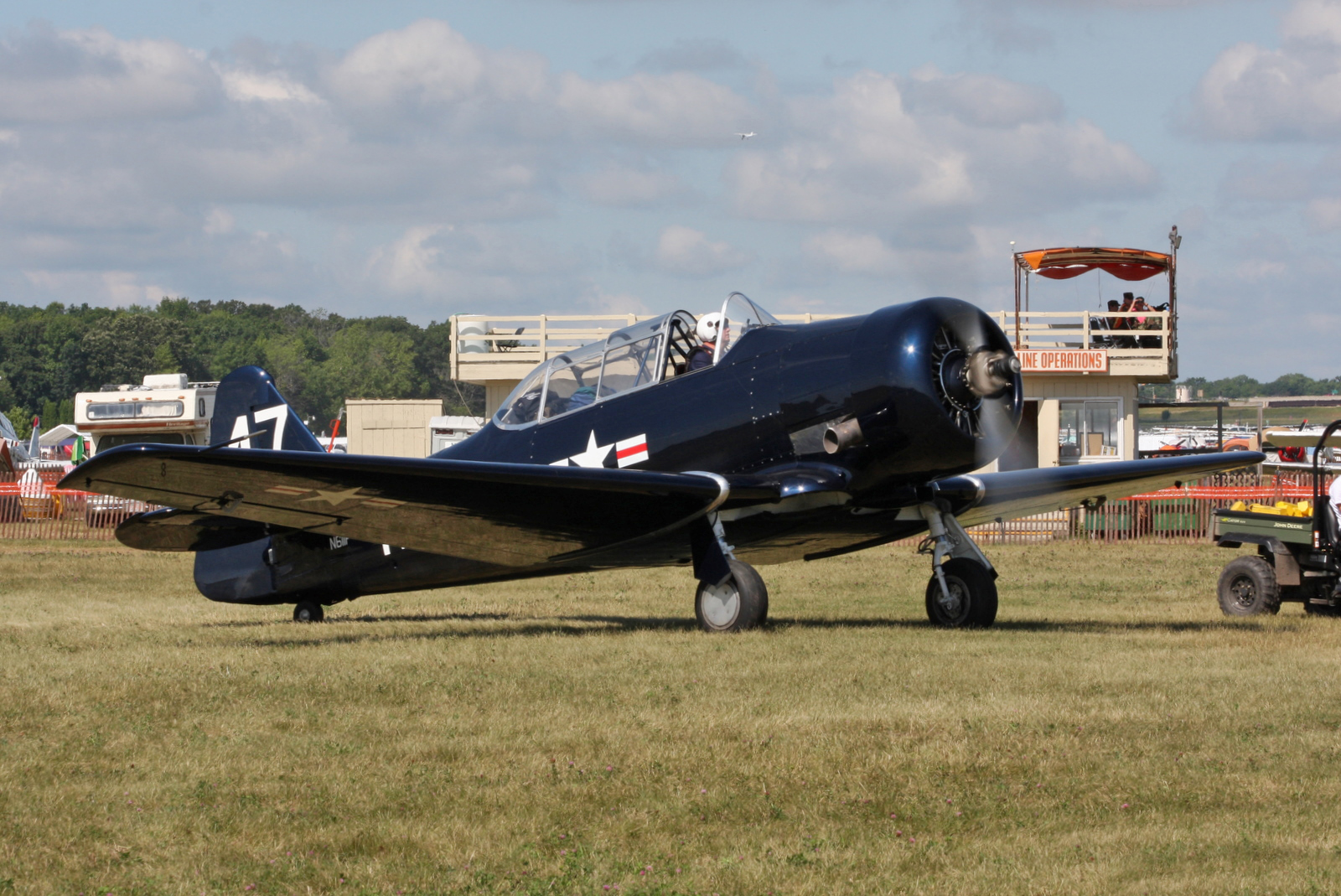 an old world war ii airplane is parked on the runway