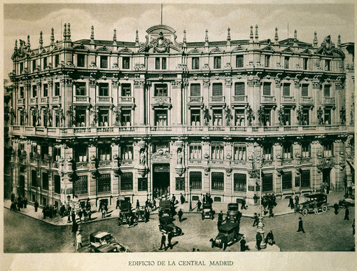 an old picture of a building in the city
