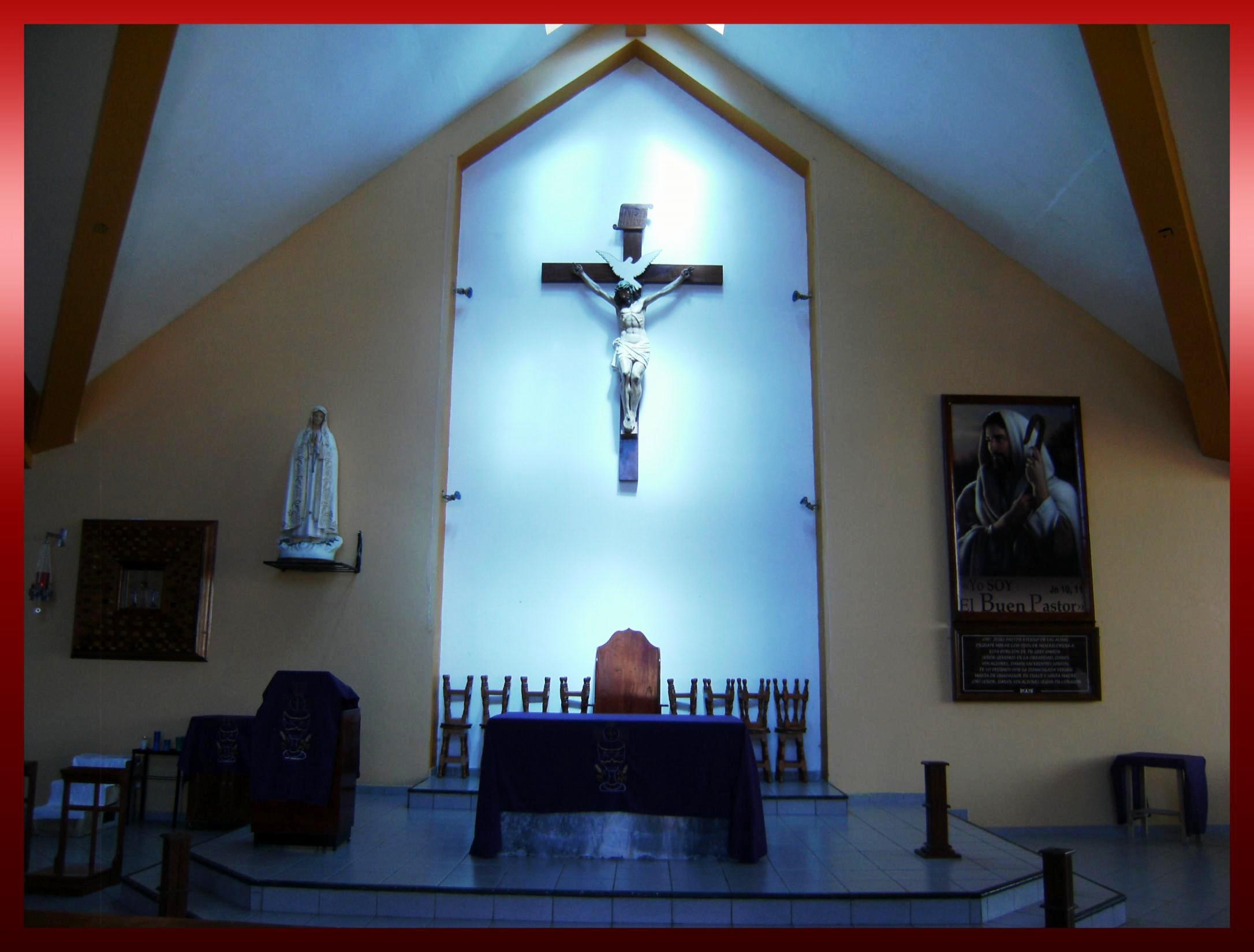 inside of church with lights and paintings on walls