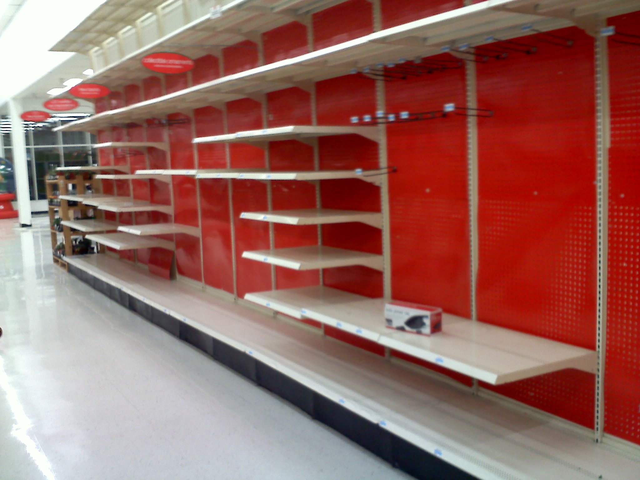 a empty shelf with shelves in a store