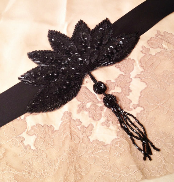 black silk garter with decorative leaf motif