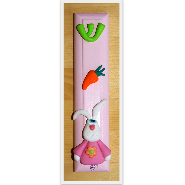 pink wooden pencil with cartoon rabbit and carrot on it