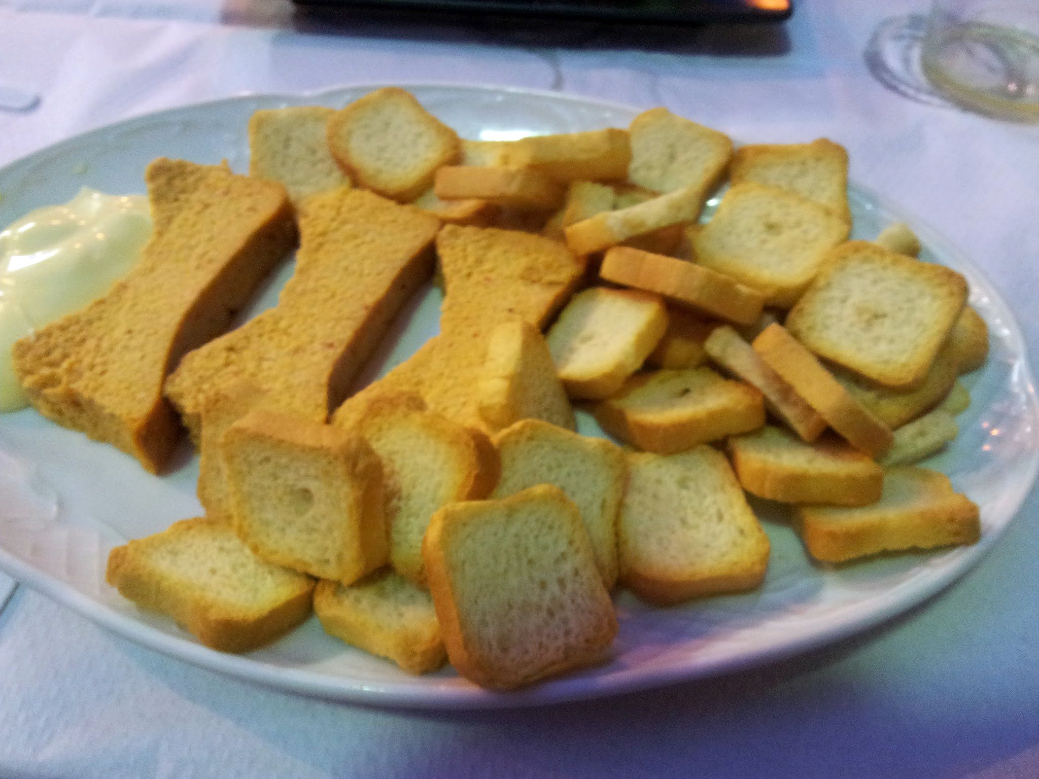 several slices of bread are arranged on a plate